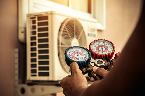 Professional Air Conditioning Service technician working in Tripler Army Medical Center, HI
